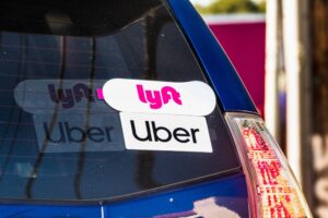 uber and lyft stickers in car window