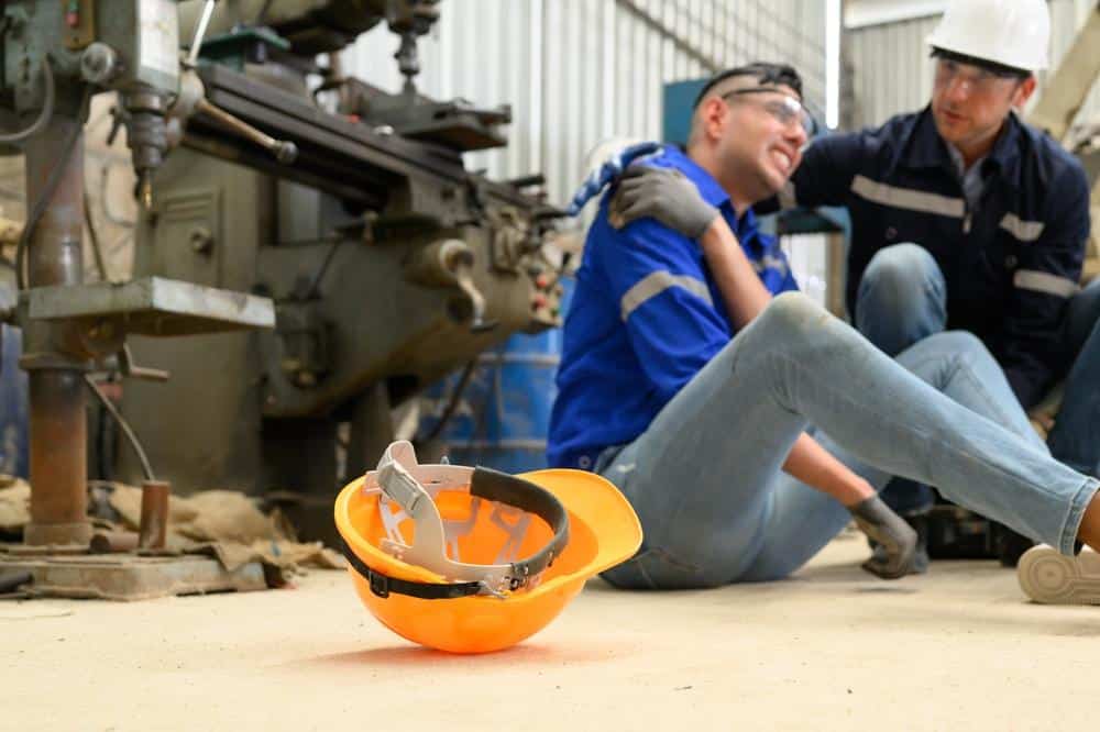 A worker using industrial gear experiences a personal injury at work in Florida, where comparative negligence laws may decide compensation amounts determined by percentage of fault.